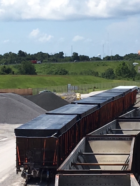 Railcar Tarps Hopper Bins Covered.jpg